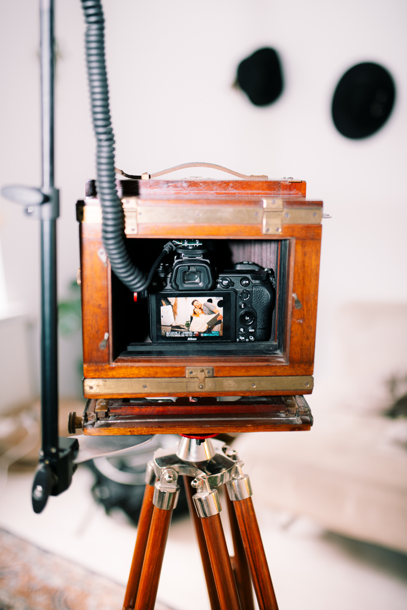 Vintage analog camera styled photobooth with a digital camera inside